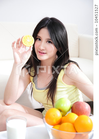 woman with fresh fruits orange 10451527