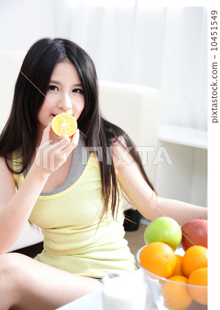 woman with fresh fruits orange 10451549