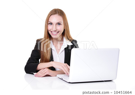 Young cheerful businesswoman sitting at the table 10451664
