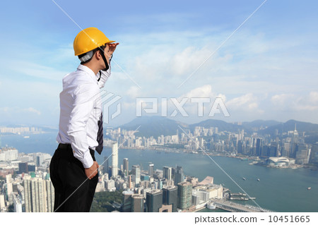 architect with helmet looking city building architect with helmet looking city building 10451665