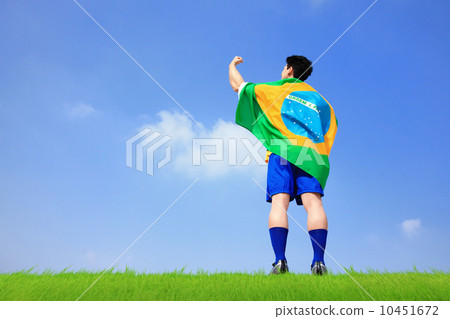 Excited man holding a brazil flag Excited man holding a brazil flag 10451672