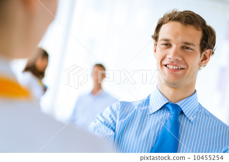 businessman shaking hands with a colleague businessman shaking hands with a colleague 10455254