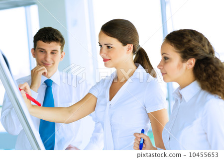 businessmen are meeting near the flipchart 10455653