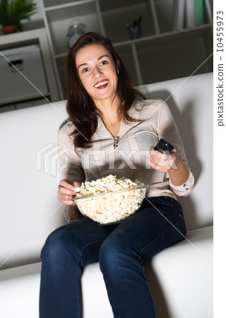 young woman watching TV young woman watching TV 10455973
