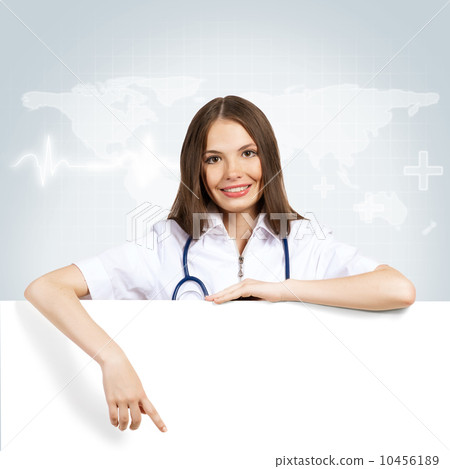 young woman doctor with a blank banner young woman doctor with a blank banner 10456189