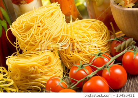 close-up of cherry tomatoes and pasta close-up of cherry tomatoes and pasta 10456431