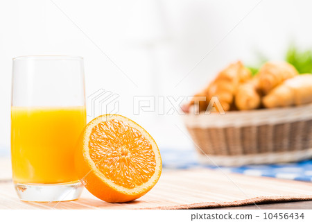 orange and a glass of orange juice orange and a glass of orange juice 10456434
