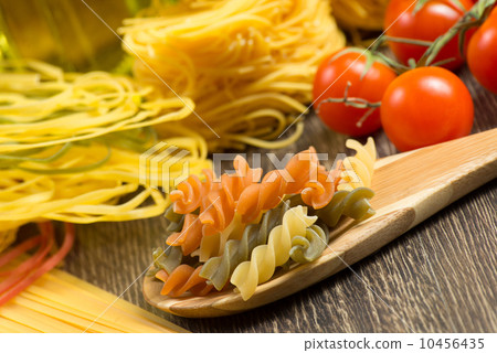 pasta on a wooden table pasta on a wooden table 10456435