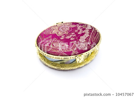 Red cosmetic mirror isolated on white background Red cosmetic mirror isolated on white background 10457067