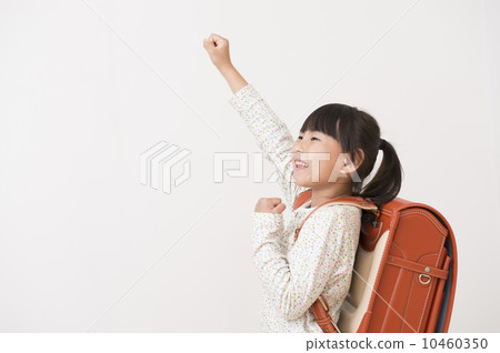 Girls carrying a school bag 10460350