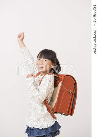 Girls carrying a school bag 10460351