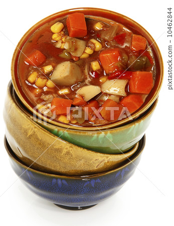 Colorful Ceramic Bowls Stacked with Maryland Crab Stew 10462844