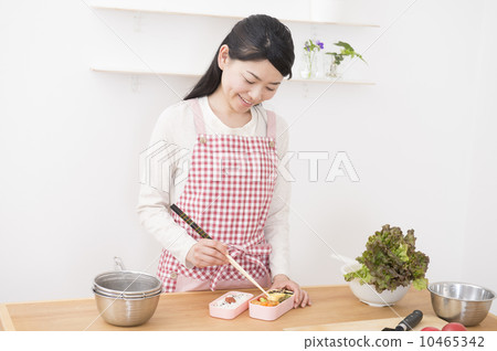 A lady with a box lunch A lady with a box lunch 10465342