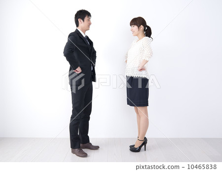 Young businessman who takes hearts · Business woman tablet whole body 10465838