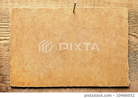 Cardboard on wooden wall 10466052