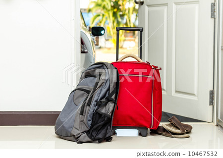 red travel bag , backpack and shoes red travel bag , backpack and shoes 10467532