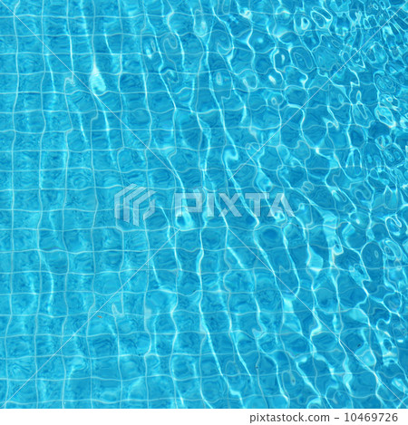 Blue rippled water background in swimming pool 10469726