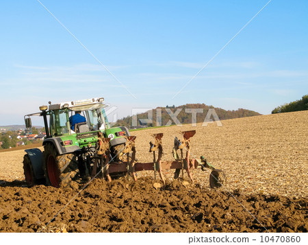 Brown Acre with green Tractor 10470860