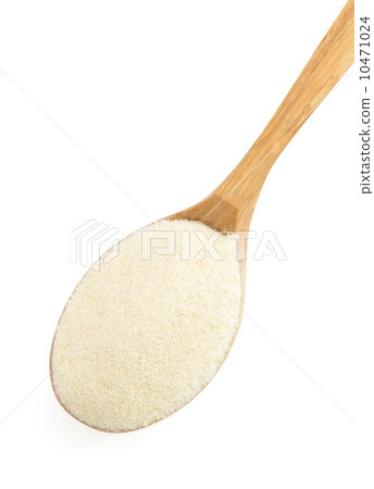 semolina in spoon on white semolina in spoon on white 10471024