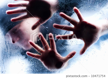 Silhouettes of person behind wet glass. Freeze to death Silhouettes of person behind wet glass. Freeze to death 10471754