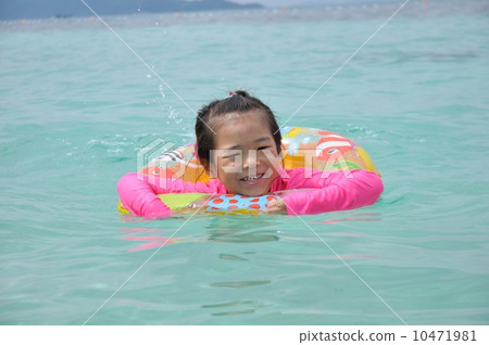 Children playing in the sea 10471981