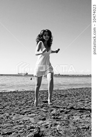 Woman on beach 10474023