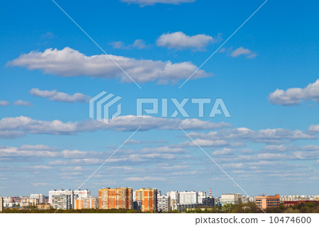 white clouds in blue sky over urban district white clouds in blue sky over urban district 10474600