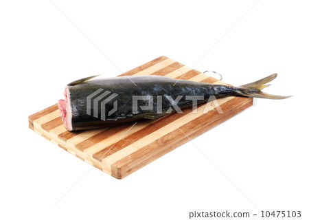 raw tuna un the cutting board isolated on white 10475103