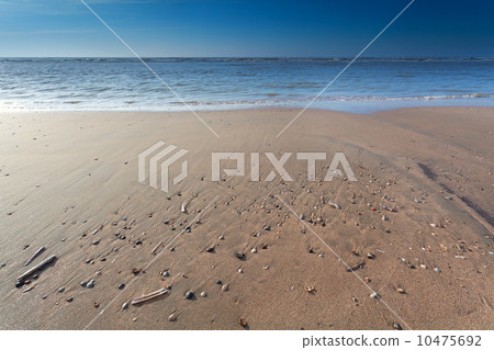 sand beach on North sea at low tide 10475692
