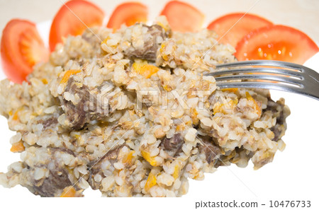 Buckwheat with meat and tomatoes 10476733