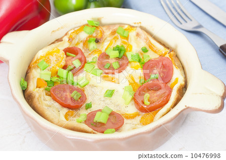 Omelet with herbs and tomatoes Omelet with herbs and tomatoes 10476998