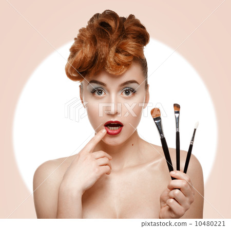 Beauty portrait of pretty woman with brush for makeup Beauty portrait of pretty woman with brush for makeup 10480221