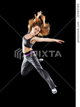 woman dancer dancing modern dance, jump on a black woman dancer dancing modern dance, jump on a black 10484565
