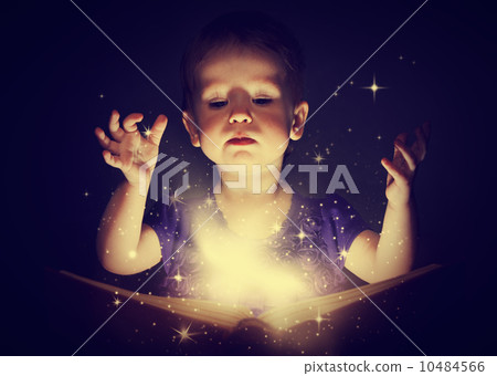 baby girl with magic book 10484566