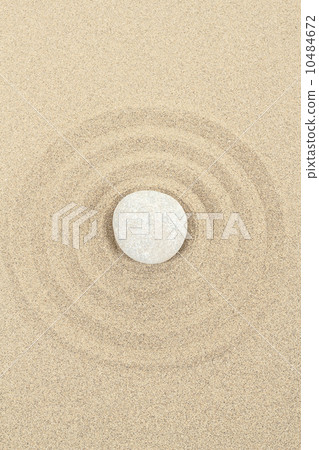 zen stone in sand with circles zen stone in sand with circles 10484672