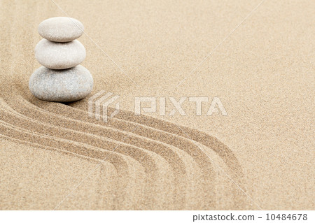 Balance zen stones in sand 10484678