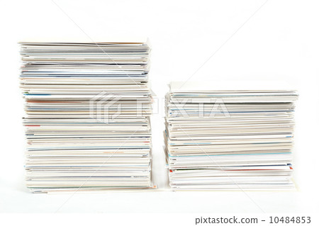 stack of business cards on the table isolated on white stack of business cards on the table isolated on white 10484853