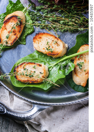 Fried bread croutons with thym Fried bread croutons with thym 10485997