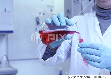 Lab assistant forgets red liquid from test tube 10487525