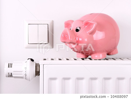 Pink piggy bank jump, saving electricity and heating costs 10488097