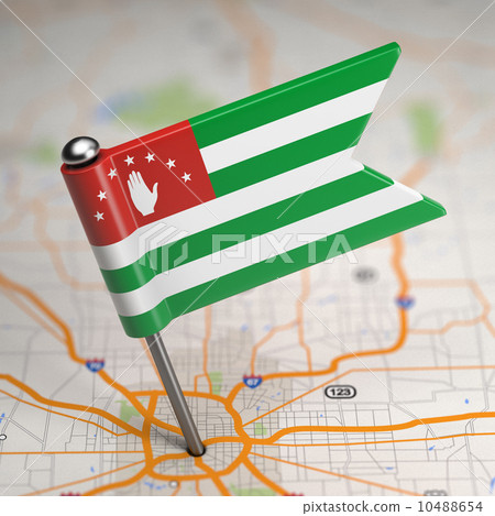 Abkhazia Small Flag on a Map Background. Abkhazia Small Flag on a Map Background. 10488654
