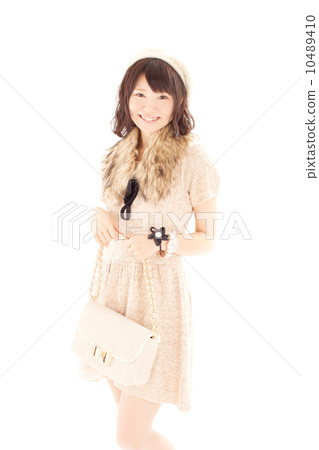 A cute Japanese girl who comes with a lovely knit dress and makes a cute pose 10489410