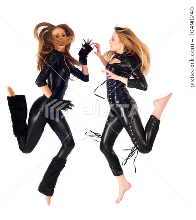 Two pretty girls jumping 10490240