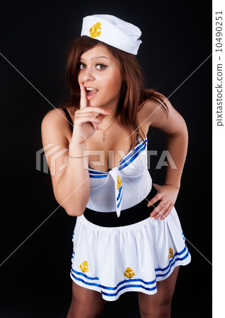 Young beautiful sailor woman with finger on lips Young beautiful sailor woman with finger on lips 10490251