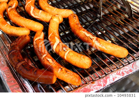 Delicious german sausages on grill 10493831