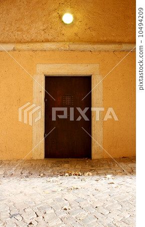 Old wooden door in Citadel Barracks in St. Petersberg Old wooden door in Citadel Barracks in St. Petersberg 10494209
