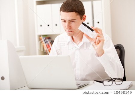 man using credit card man using credit card 10498149