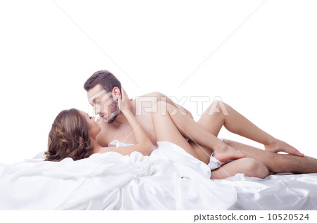 Flushed lovers posing in bed, isolated on white Flushed lovers posing in bed, isolated on white 10520524