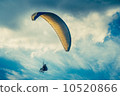 Paragliding extreme Sport with blue Sky and clouds on background Healthy Lifestyle 10520866