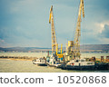 Sea port Crane and ships cargo industrial construction building 10520868
